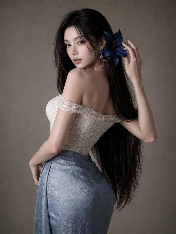 Side-profile portrait with a blue hair accessory