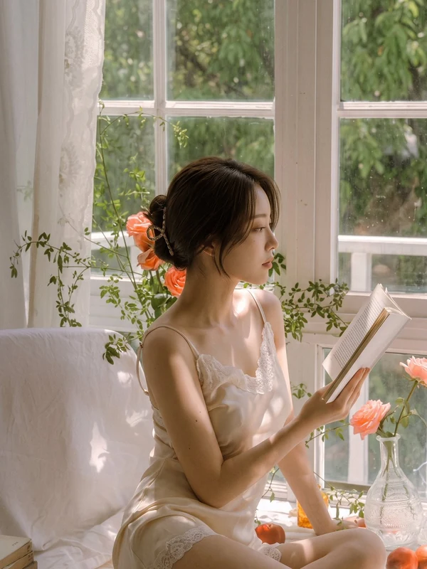 Quiet reading portrait beside a window